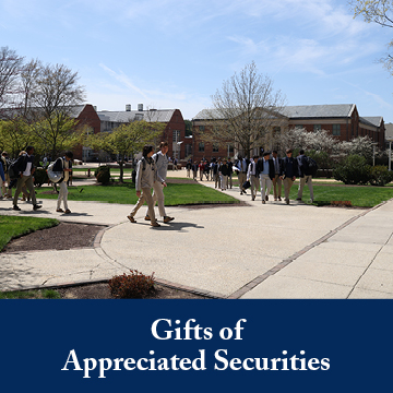 Students walking outside. Links to Gifts of Appreciated Securities